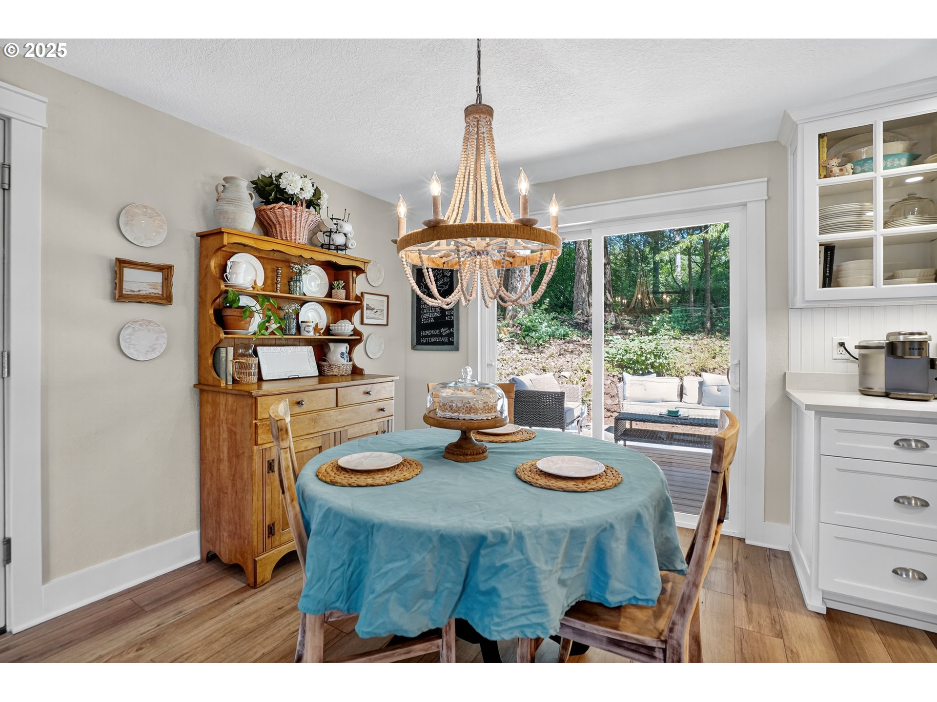 26280 South Beavercreek Road Beavercreek, OR 97004 - Photo 18 of 39 a view of a dining room with furniture large windows and wooden floor