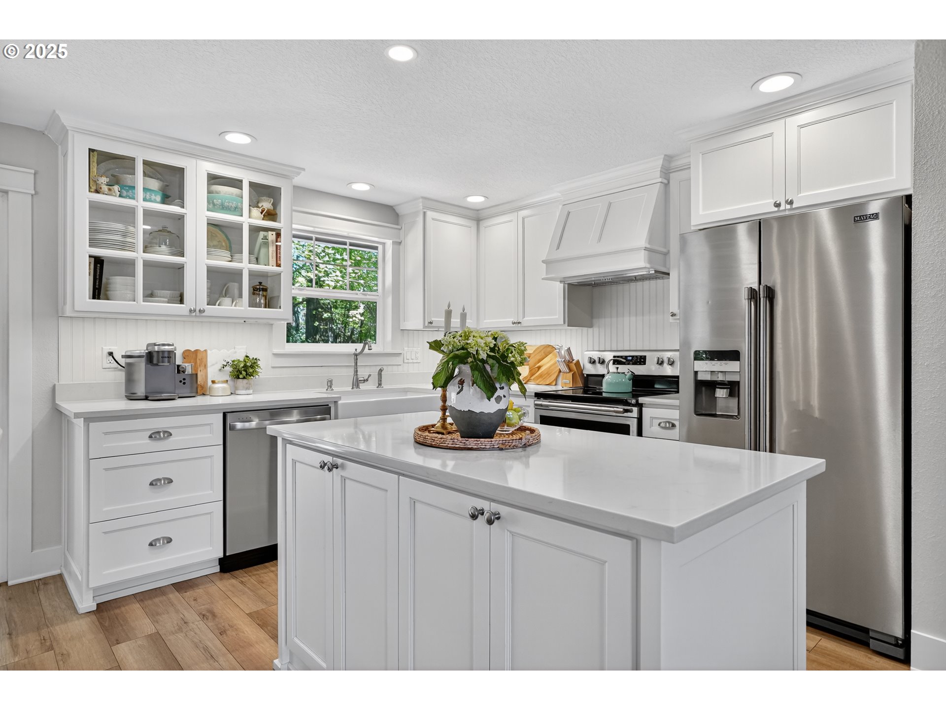 26280 South Beavercreek Road Beavercreek, OR 97004 - Photo 10 of 39 a kitchen with white cabinets and stainless steel appliances