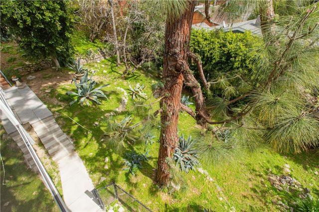a spacious bathroom with a tub and shower
