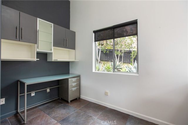 a room with a table and chairs