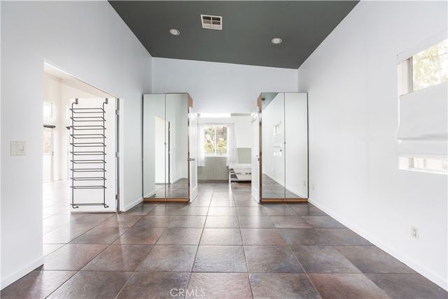 a bathroom with a shower and a toilet