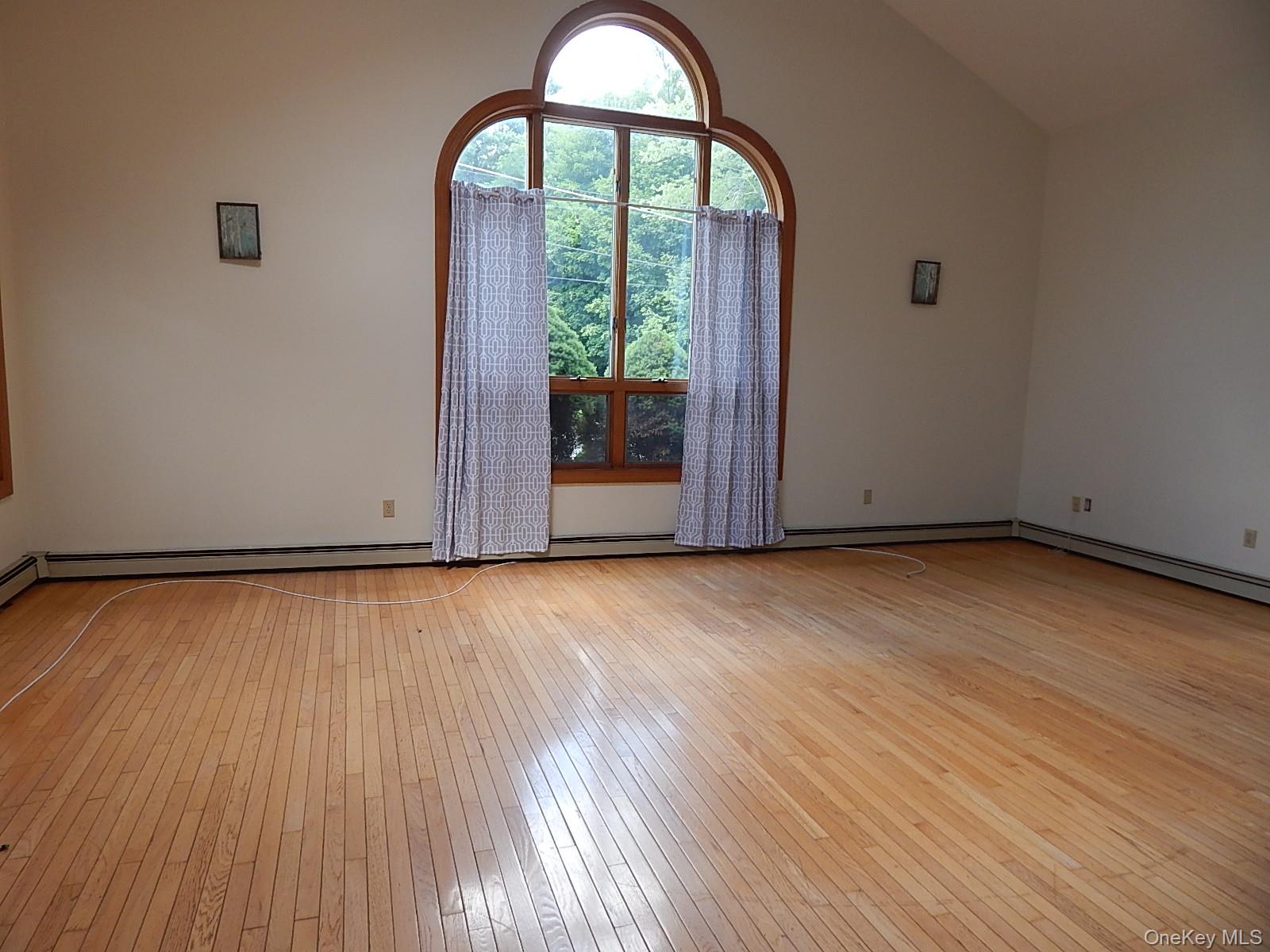 16 Kenton Road Patterson, NY 12563 - Photo 5 of 20 a view of a room with wooden floor and natural light