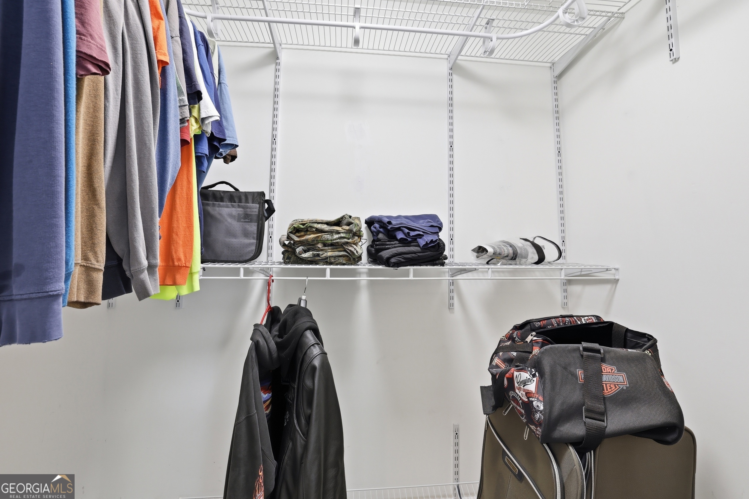 23 Cane Brake Circle Toccoa, GA 30577 - Photo 29 of 35 a view of walk in closet with clothes and shoes