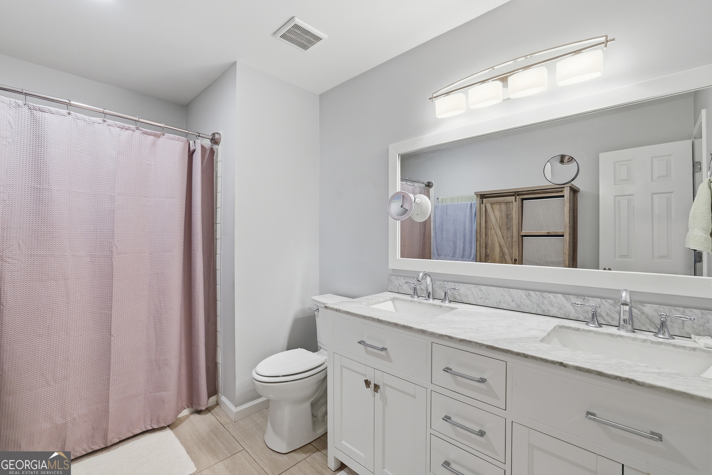 23 Cane Brake Circle Toccoa, GA 30577 - Photo 30 of 35 a bathroom with a granite countertop sink toilet and shower