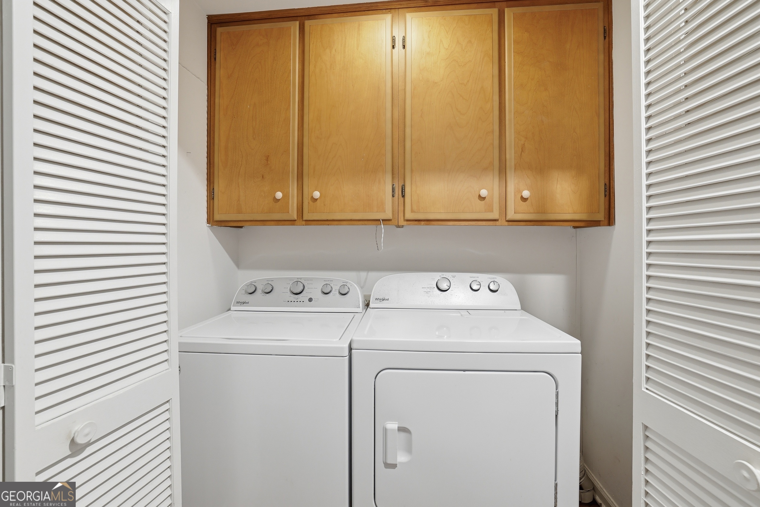 23 Cane Brake Circle Toccoa, GA 30577 - Photo 32 of 35 a view of storage and utility room with washer and dryer