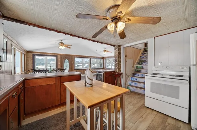 a bedroom with furniture and wooden floor