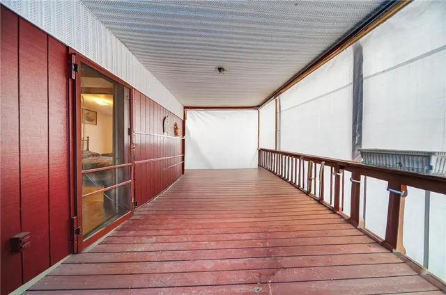 a swimming pool with outdoor seating and yard