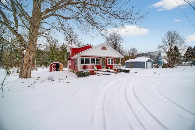 a swimming pool with outdoor seating and yard