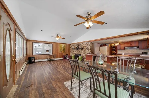a very nice looking dining room with a table and chairs