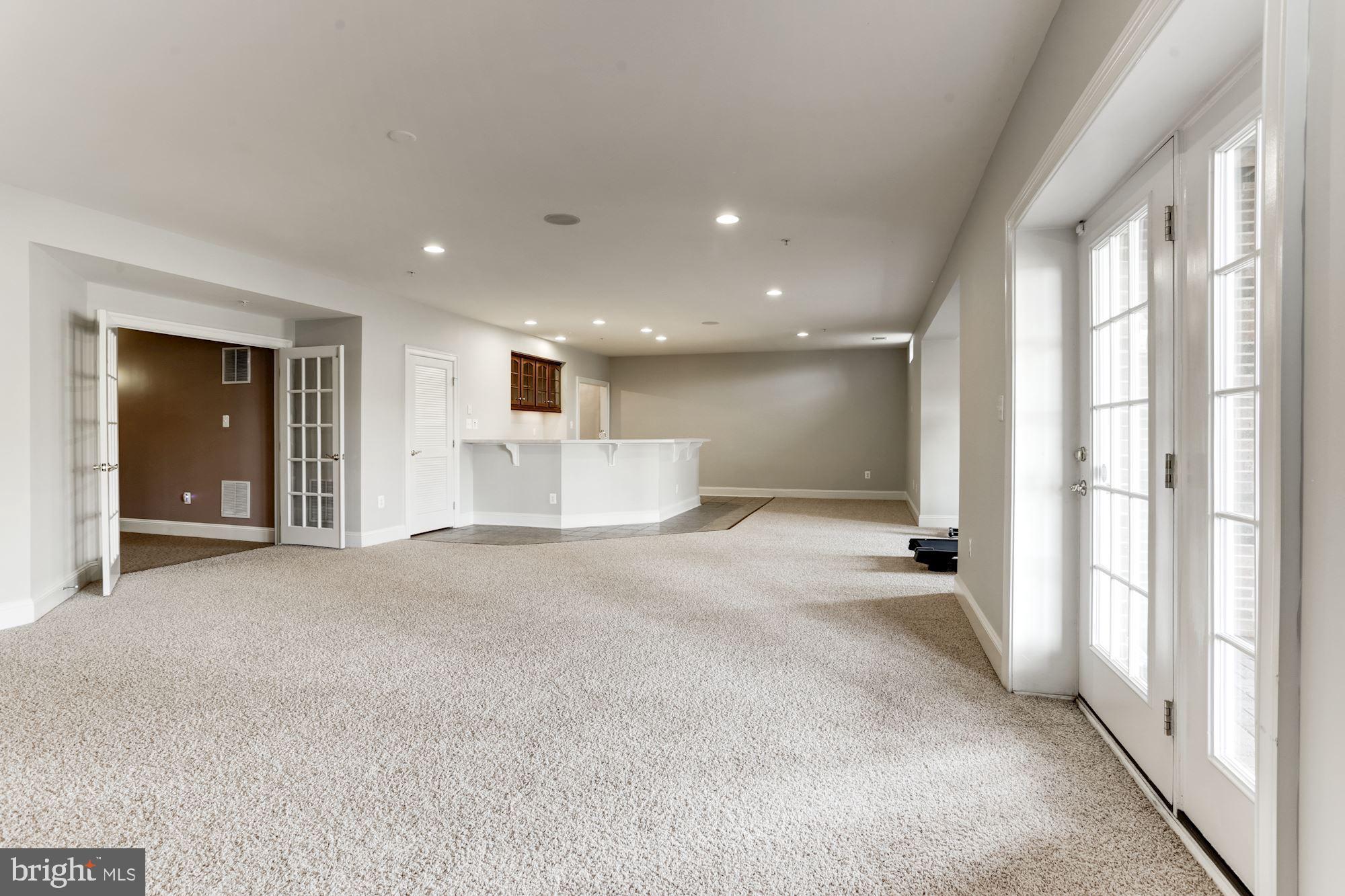 15131 Ganley Road Boyds, MD 20841 - Photo 19 of 23 Lower Level Recreation Room