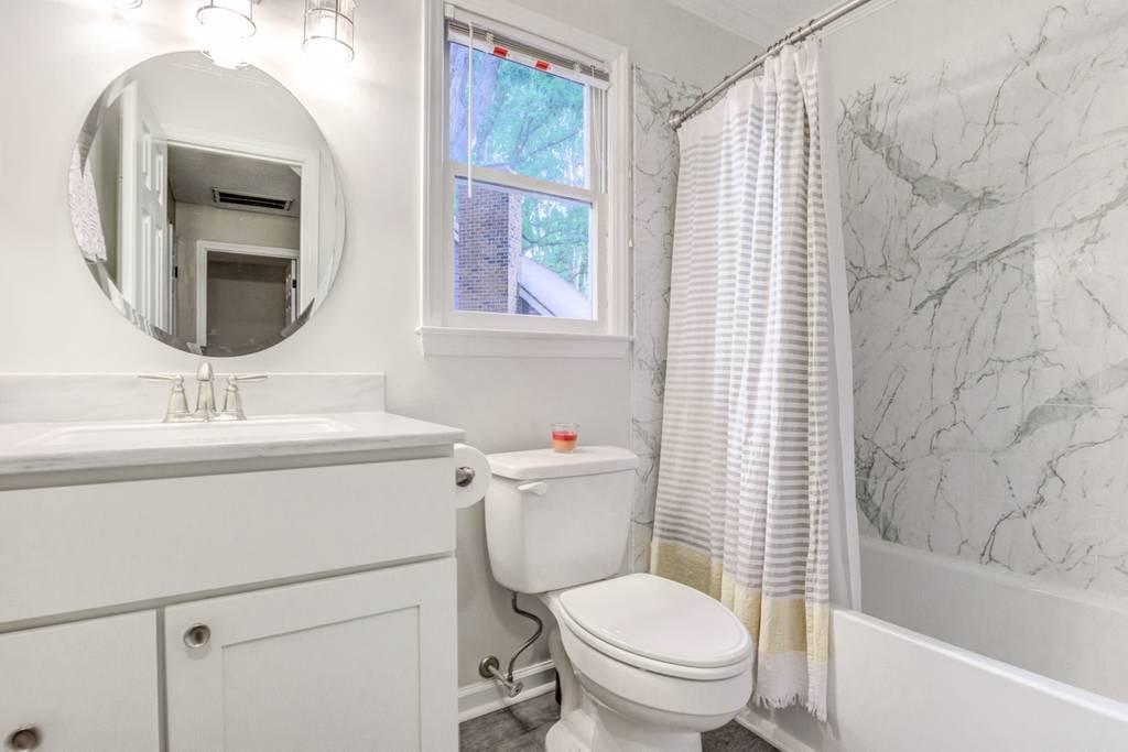 6901 Sandringham Drive Raleigh, NC 27613 - Photo 21 of 30 Updated Hall Bathroom