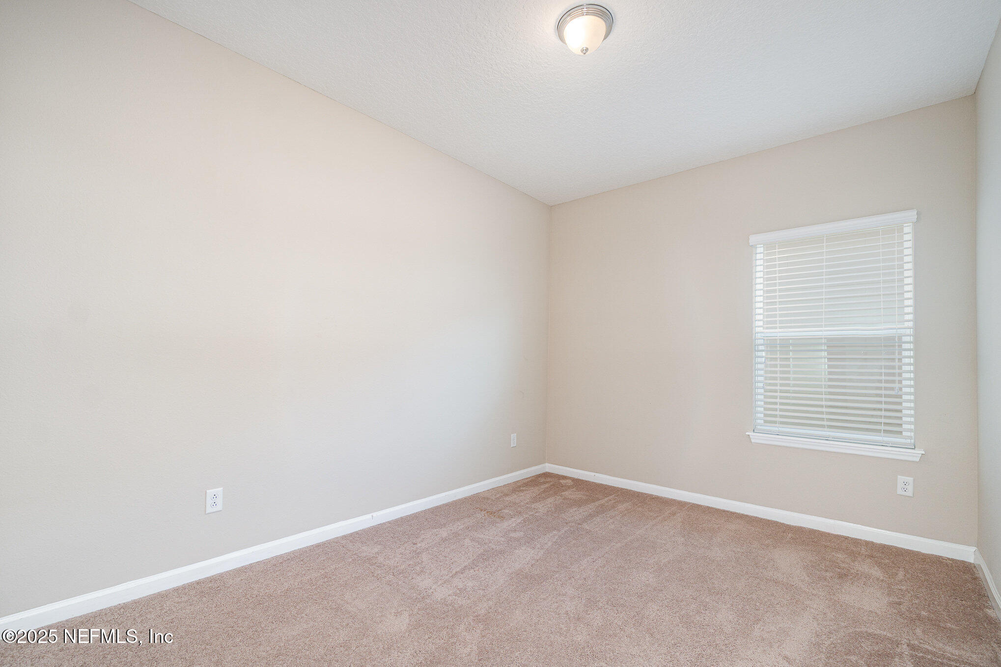 4220 Arbor Mill Circle Orange Park, FL 32065 - Photo 17 of 23 an empty room with a window