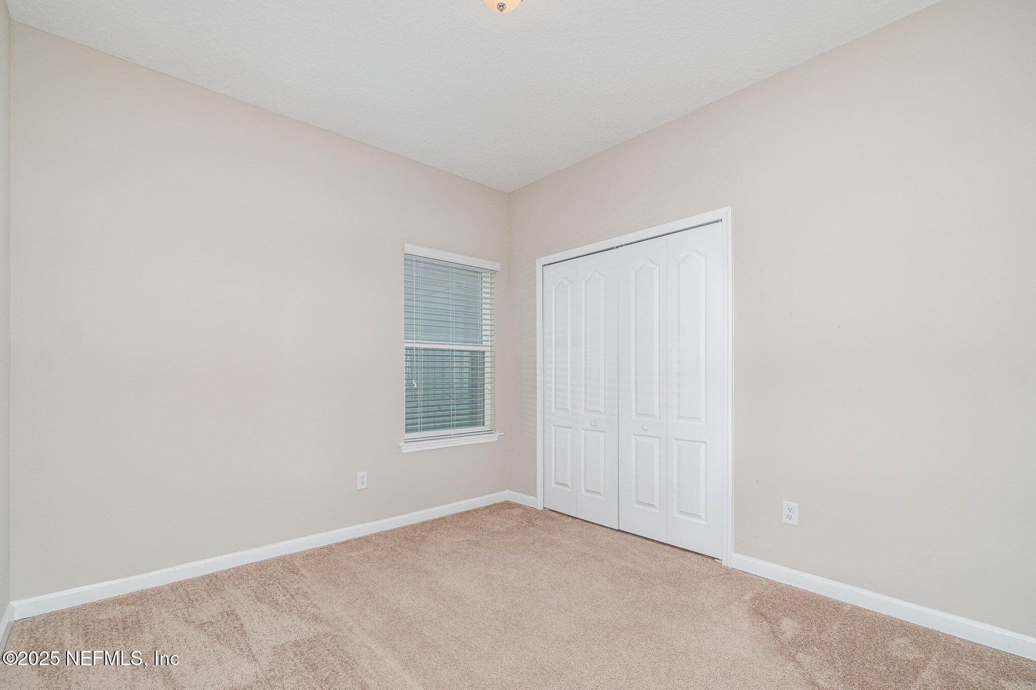 4220 Arbor Mill Circle Orange Park, FL 32065 - Photo 18 of 23 an empty room with windows