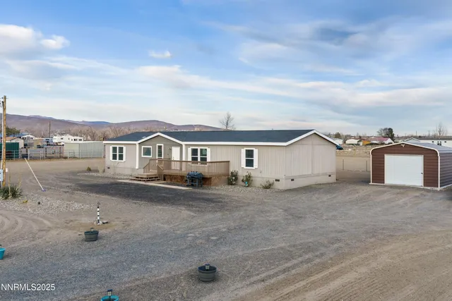 a view of a house with patio