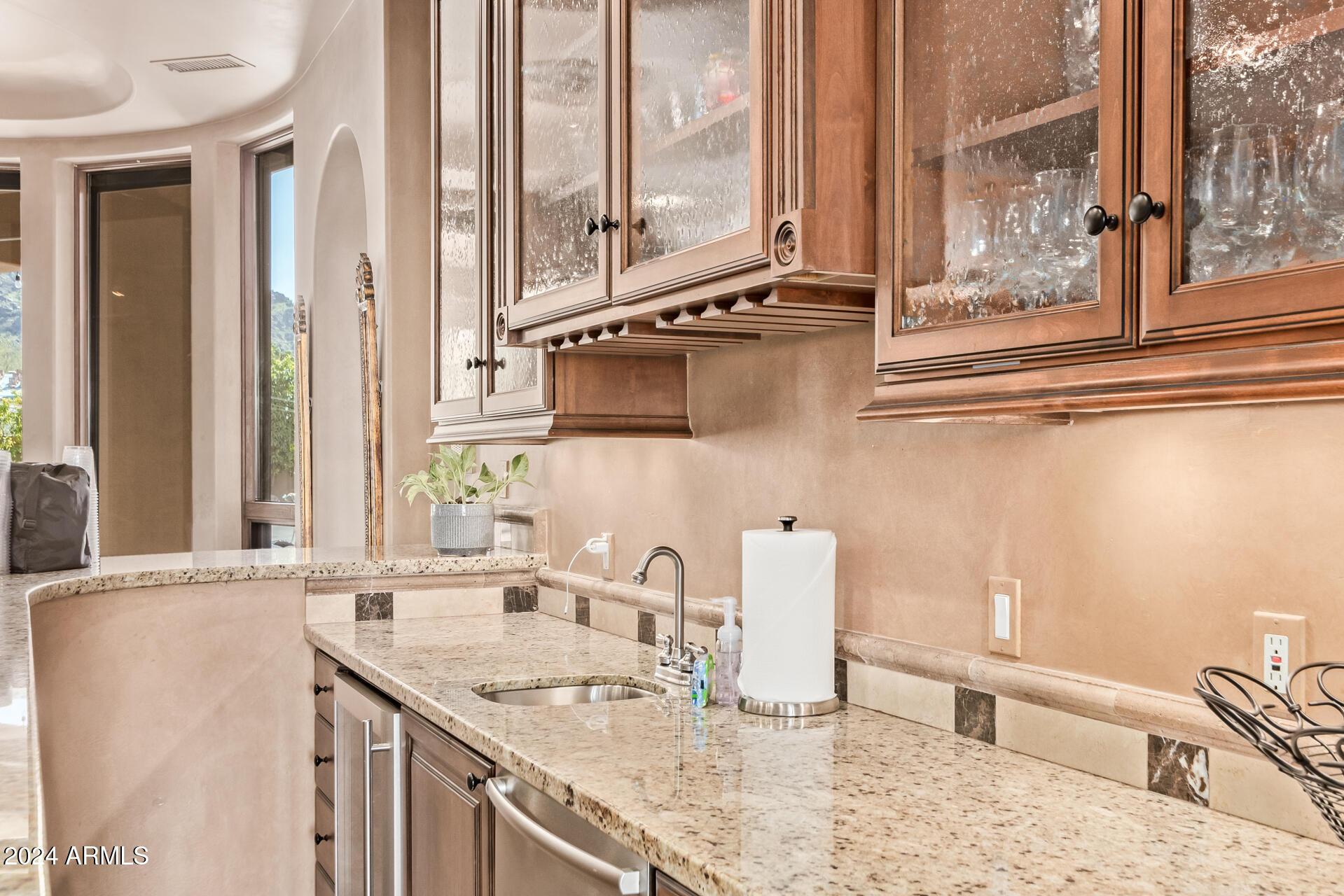 5339 East Royal Palm Road Paradise Valley, AZ 85253 - Photo 13 of 95 a bathroom with a granite countertop sink and a large mirror