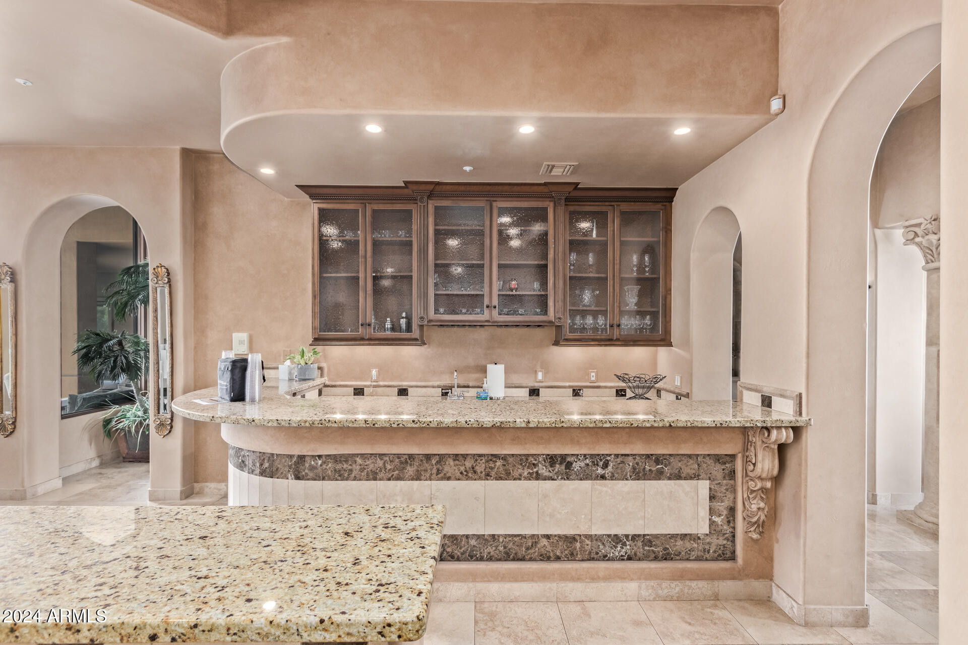 5339 East Royal Palm Road Paradise Valley, AZ 85253 - Photo 15 of 95 a bathroom with a granite countertop sink and a mirror