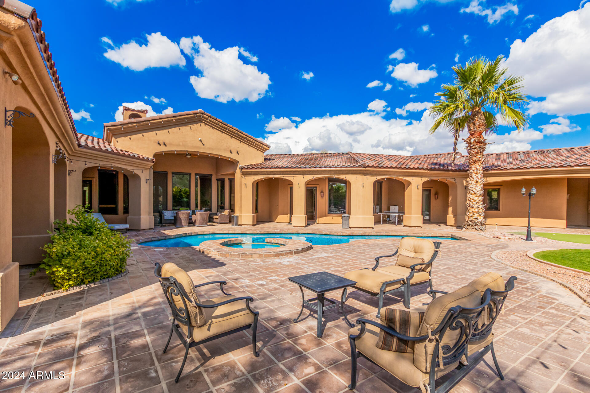 5339 East Royal Palm Road Paradise Valley, AZ 85253 - Photo 3 of 95 a view of a house with swimming pool and sitting area