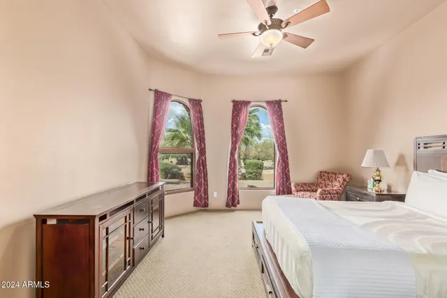 a aerial view of a house with a swimming pool