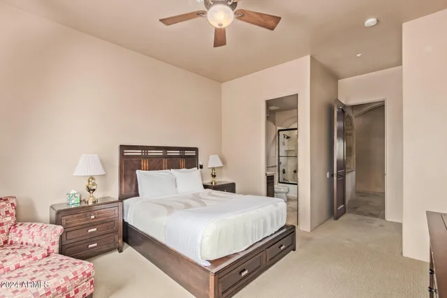 an aerial view of a house with a swimming pool