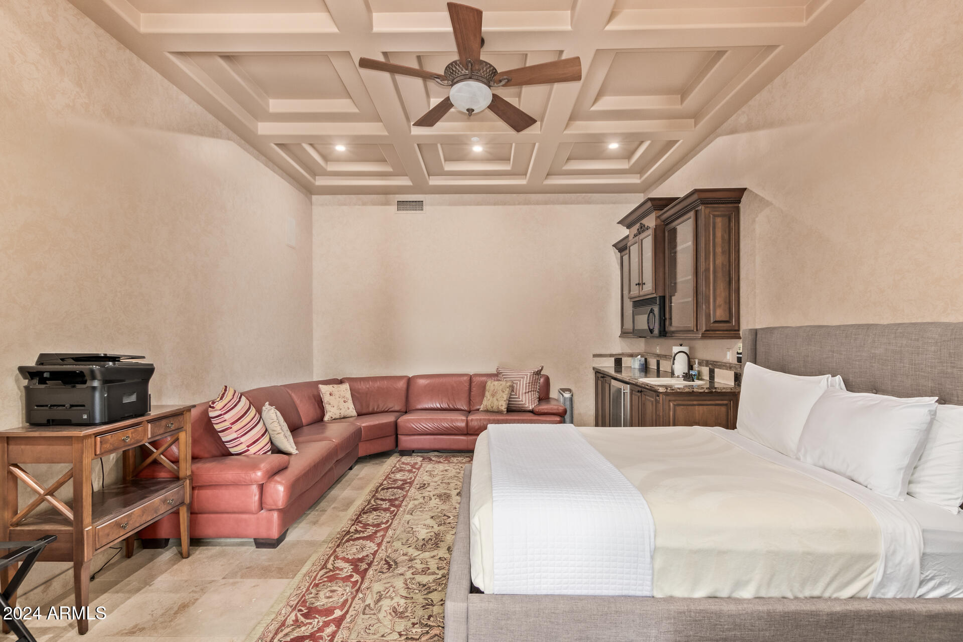 5339 East Royal Palm Road Paradise Valley, AZ 85253 - Photo 51 of 95 a bedroom with a bed a couch and chandelier