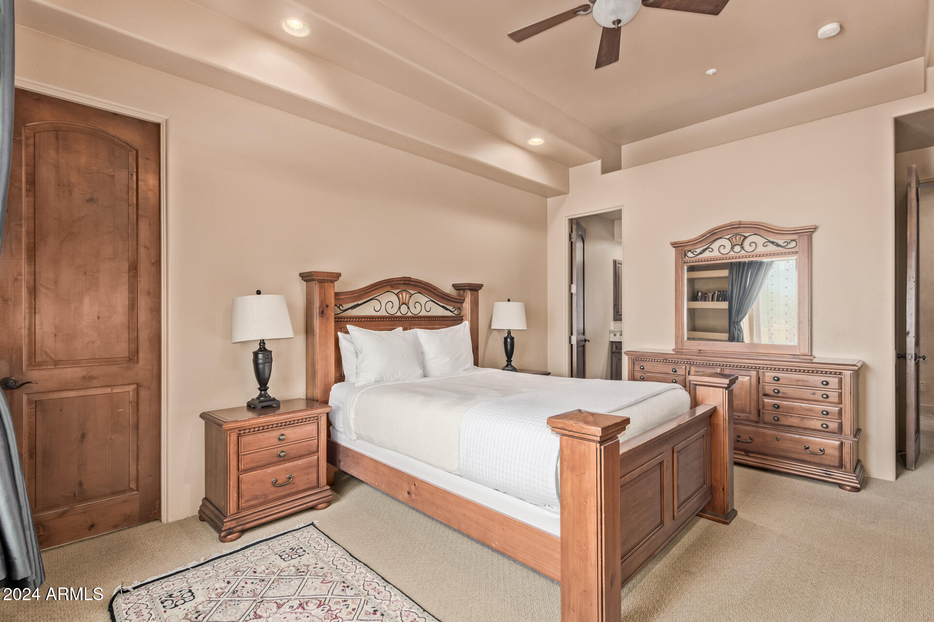 5339 East Royal Palm Road Paradise Valley, AZ 85253 - Photo 58 of 95 a bedroom with a bed and a dresser