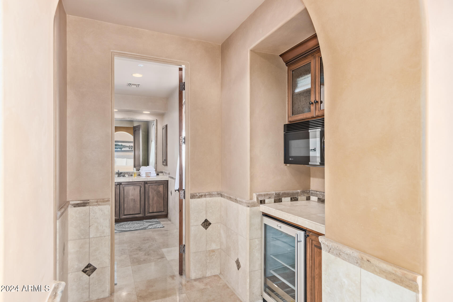 5339 East Royal Palm Road Paradise Valley, AZ 85253 - Photo 65 of 95 a bathroom with a sink and a mirror