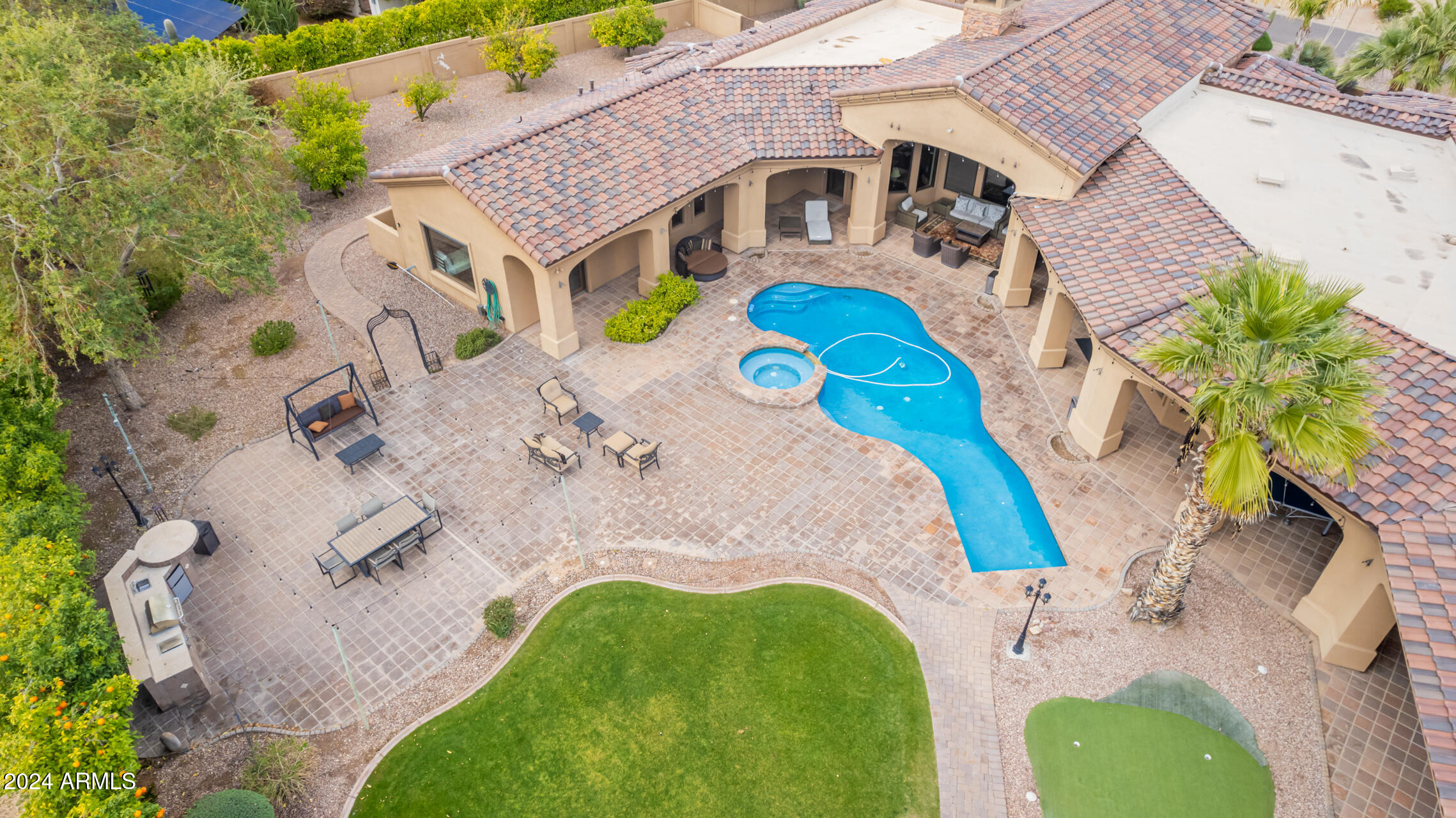 5339 East Royal Palm Road Paradise Valley, AZ 85253 - Photo 72 of 95 a aerial view of a house with a swimming pool