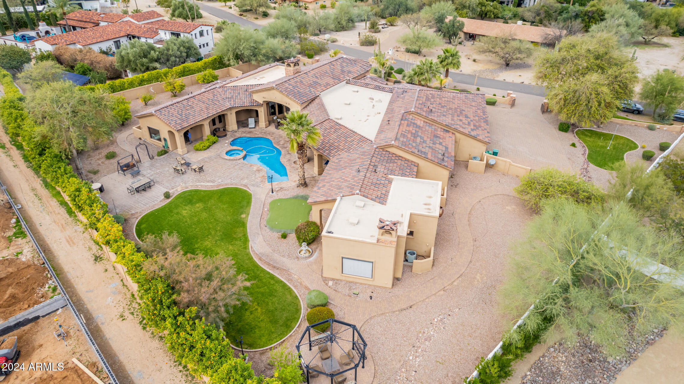 5339 East Royal Palm Road Paradise Valley, AZ 85253 - Photo 73 of 95 an aerial view of a house with a swimming pool