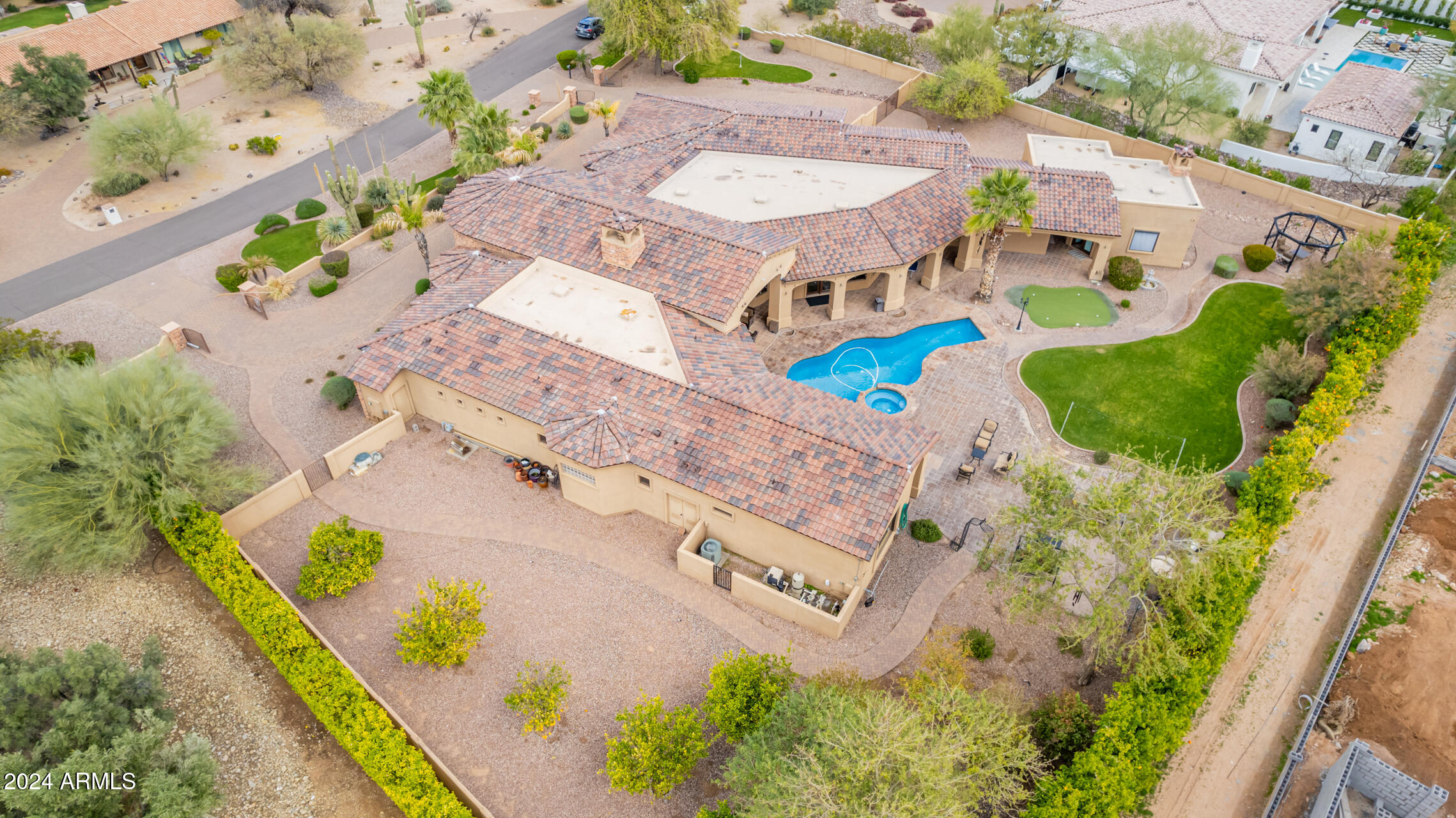5339 East Royal Palm Road Paradise Valley, AZ 85253 - Photo 74 of 95 an aerial view of a house with a swimming pool