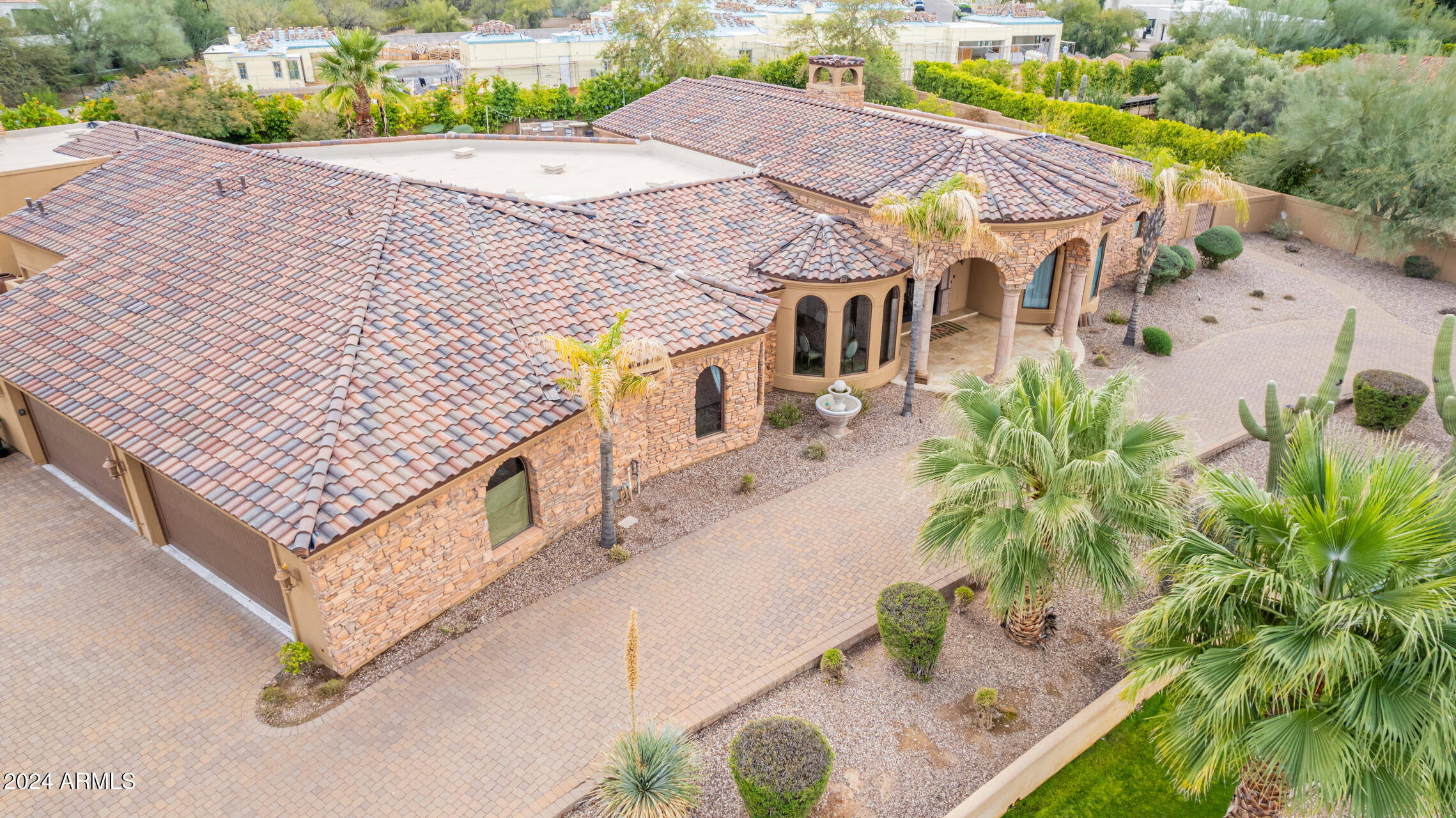 5339 East Royal Palm Road Paradise Valley, AZ 85253 - Photo 76 of 95 an aerial view of a house with a yard