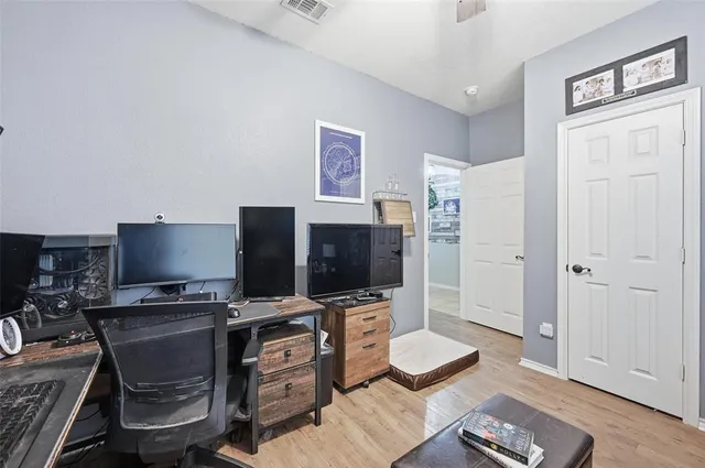 a room with furniture and a flat screen tv