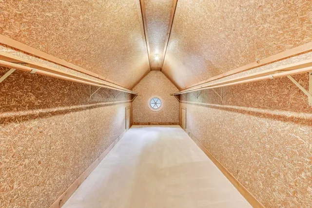 a bathroom with a sink a toilet a shower curtain and a mirror