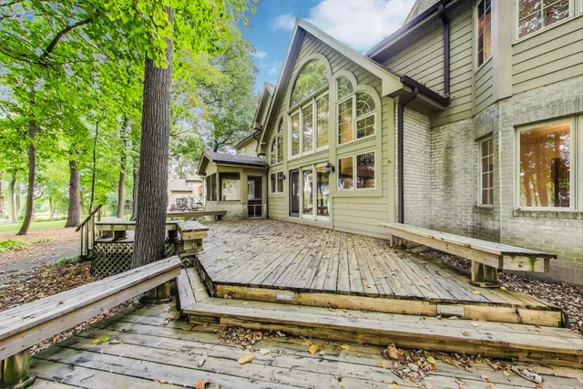 a aerial view of a house with yard