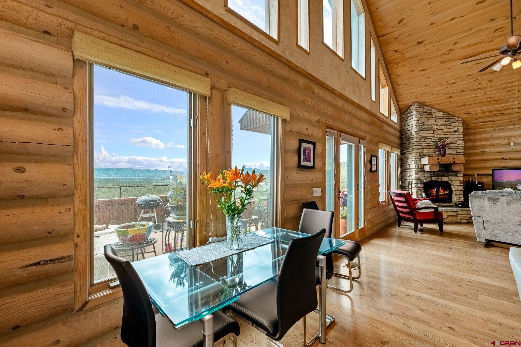 10266 Road 35 Mancos, CO 81328 - Photo 30 of 45 a view of a dining room with furniture window and outside view