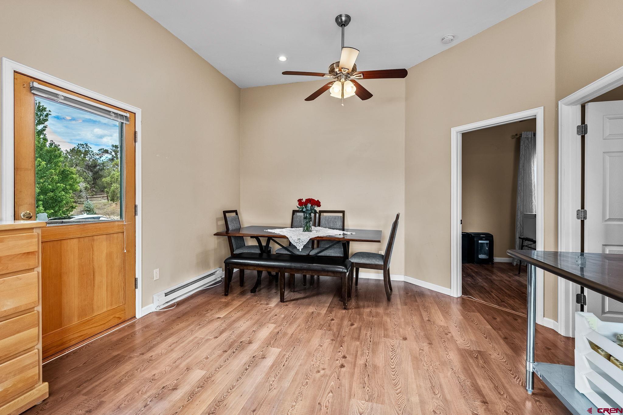 10266 Road 35 Mancos, CO 81328 - Photo 8 of 45 a view of a workspace with furniture window and wooden floor