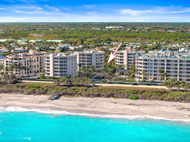 an aerial view of residential building and lake view