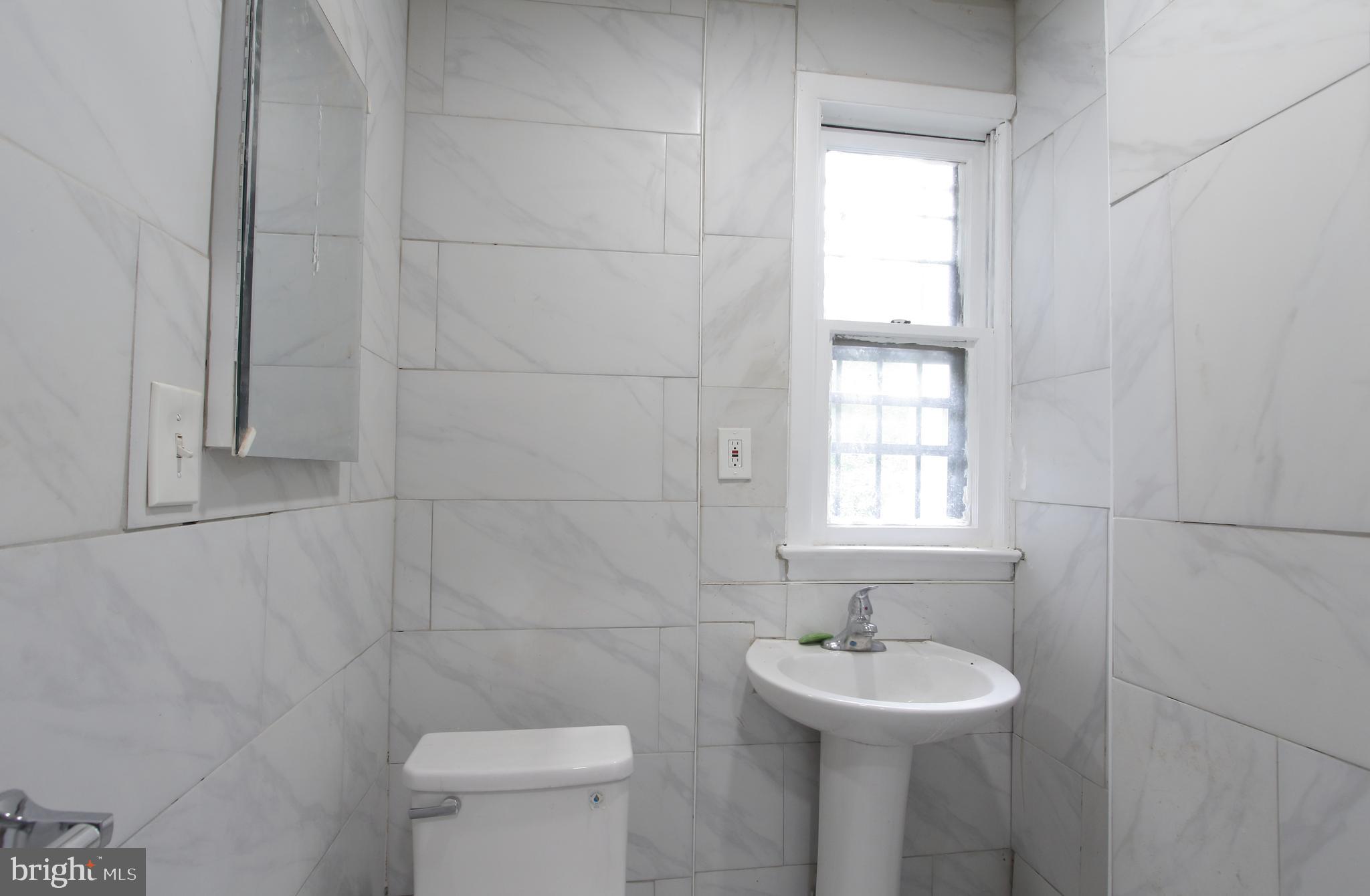 803 Mary Street Chester, PA 19013 - Photo 13 of 29 1st Flr Half-bath