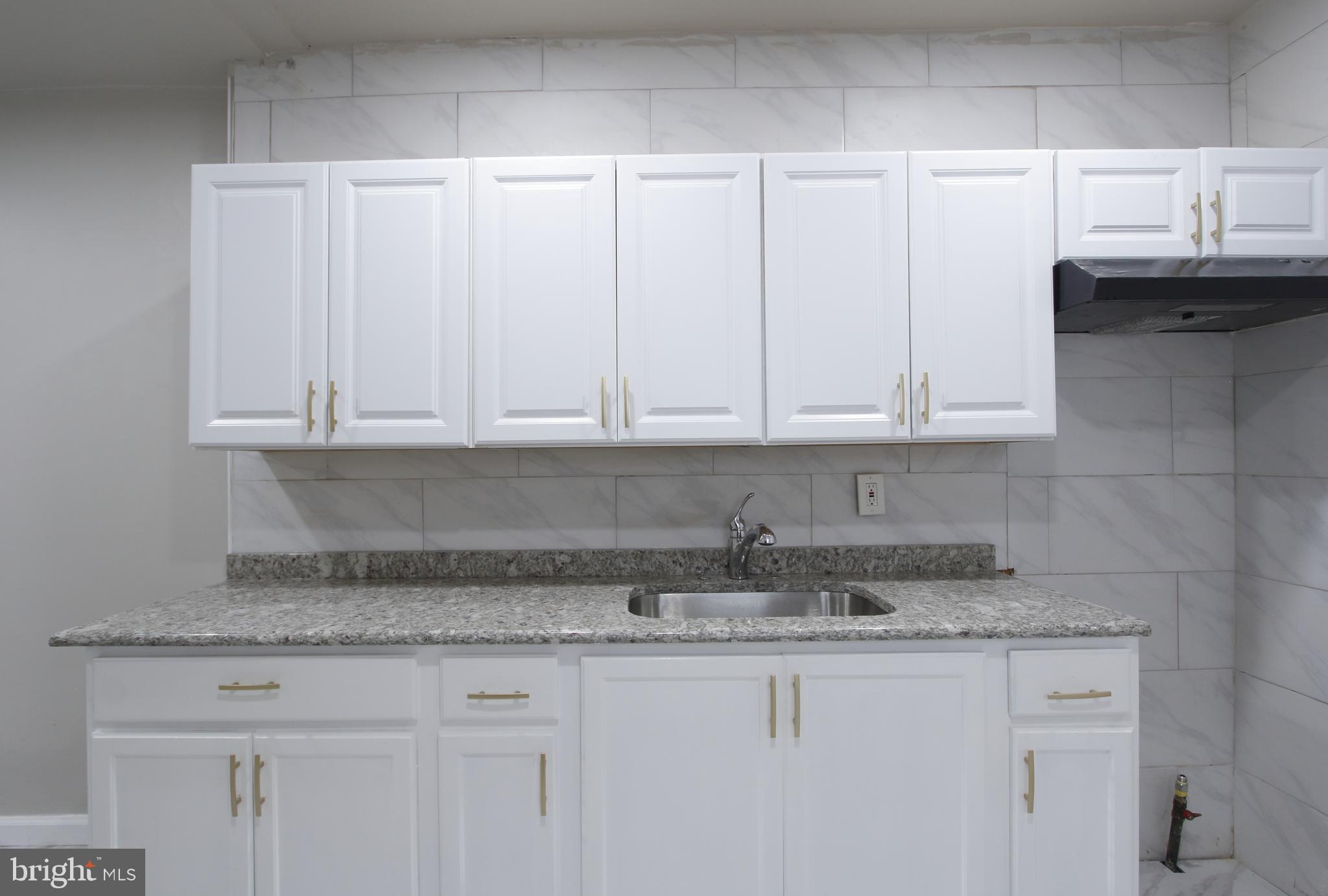 803 Mary Street Chester, PA 19013 - Photo 9 of 29 Kitchen, new cabinets & granite countertop