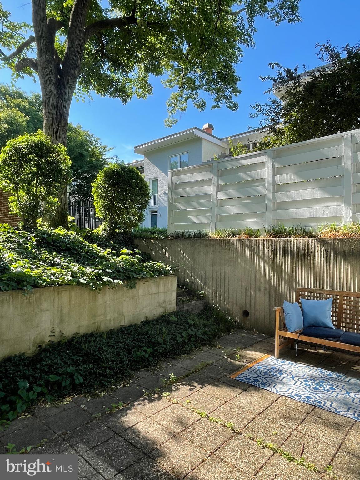 817 Delaware Avenue Southwest, Unit 227 Washington, DC 20024 - Photo 19 of 27 a view of a backyard with sitting area