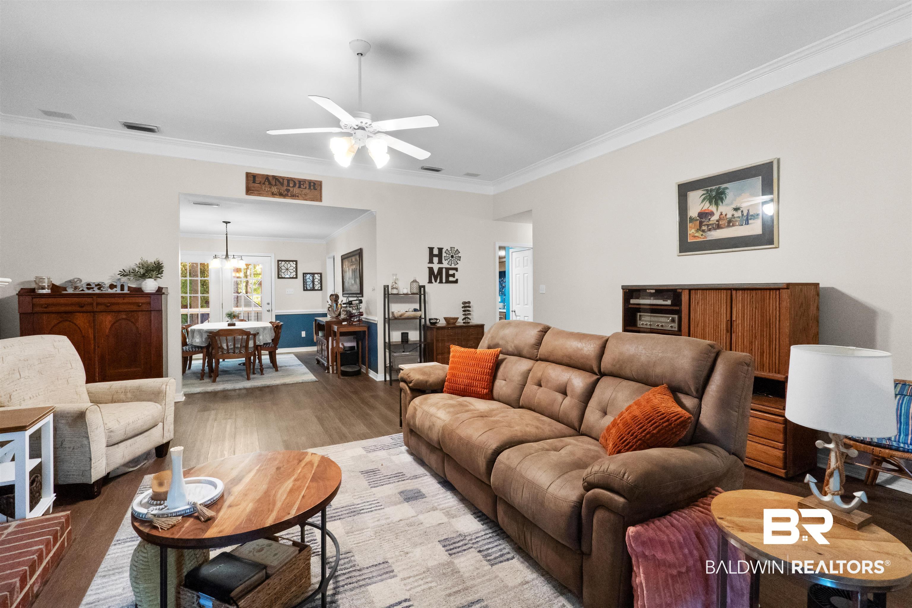 153 Lakeview Loop Daphne, AL 36526 - Photo 14 of 56 Whether hosting guests or enjoying a quiet evening at home, this versatile living area adapts beautifully to your lifestyle.