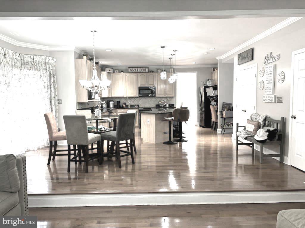 9319 Migan Road Randallstown, MD 21133 - Photo 9 of 32 a view of a dining room and livingroom view