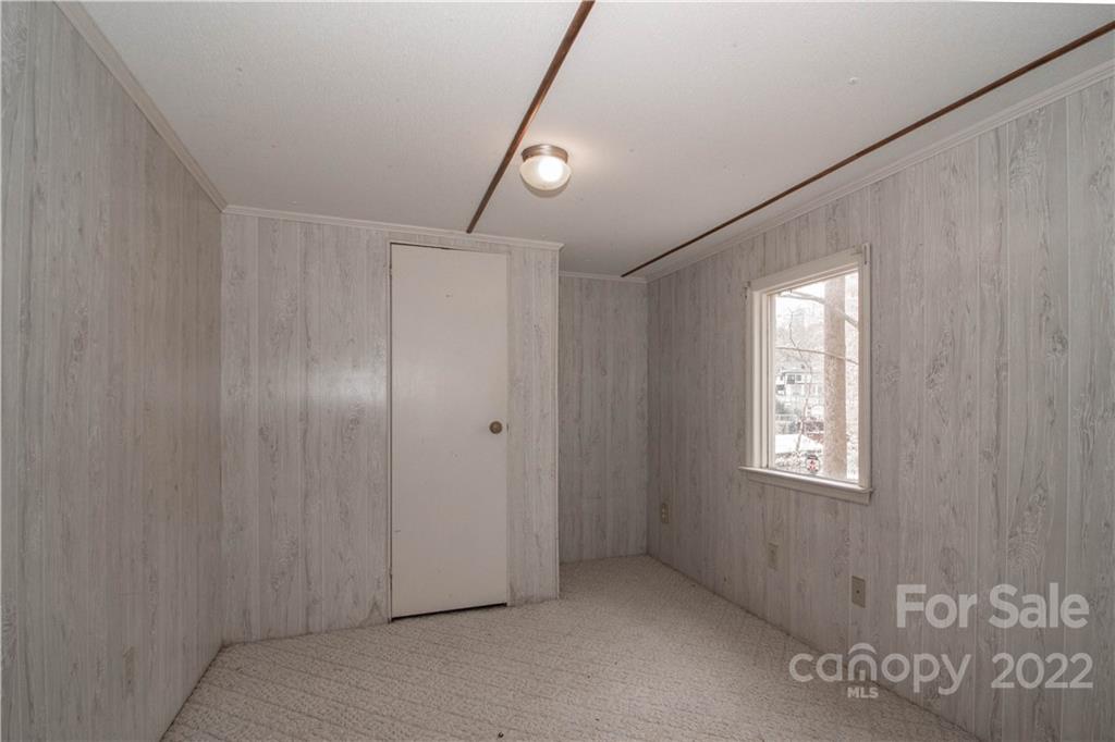 8785 Holdsclaw Road Terrell, NC 28682 - Photo 14 of 35 a view of an empty room with a window