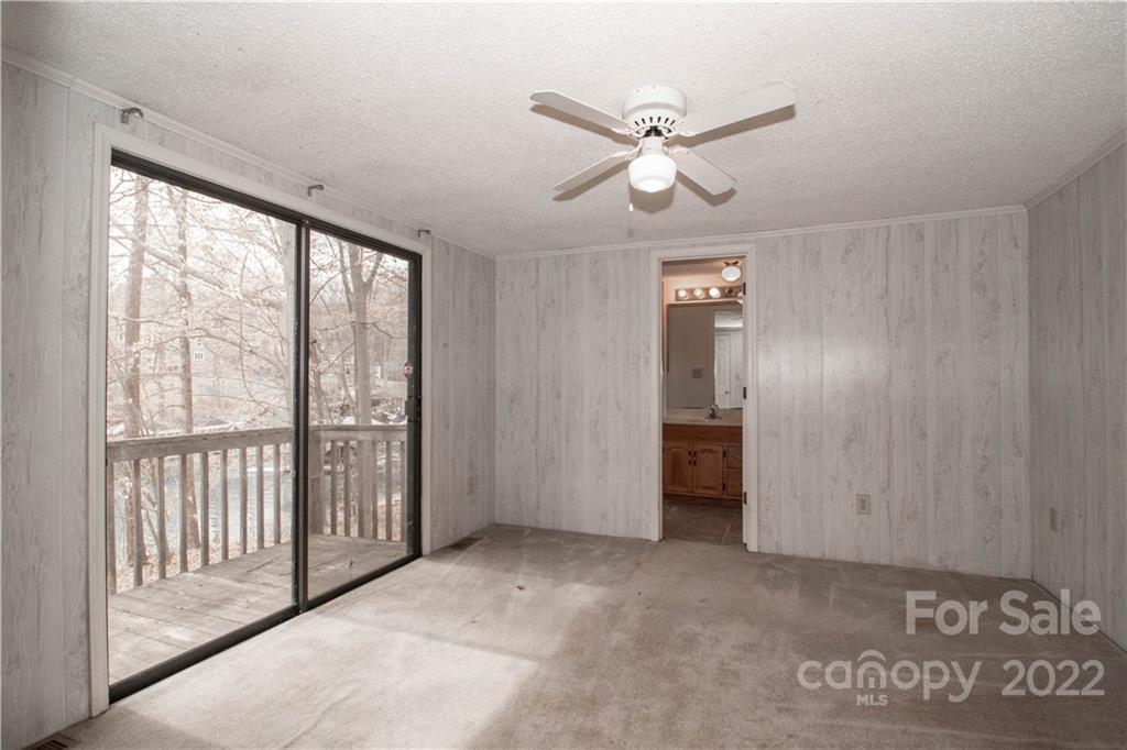 8785 Holdsclaw Road Terrell, NC 28682 - Photo 20 of 35 a view of an empty room with a window