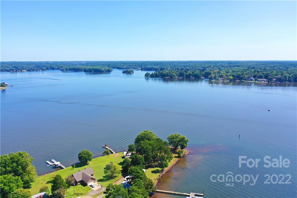 8785 Holdsclaw Road Terrell, NC 28682 - Photo 34 of 35 a view of a lake with houses in background