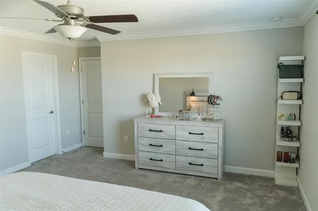 a room with a dresser and a mirror