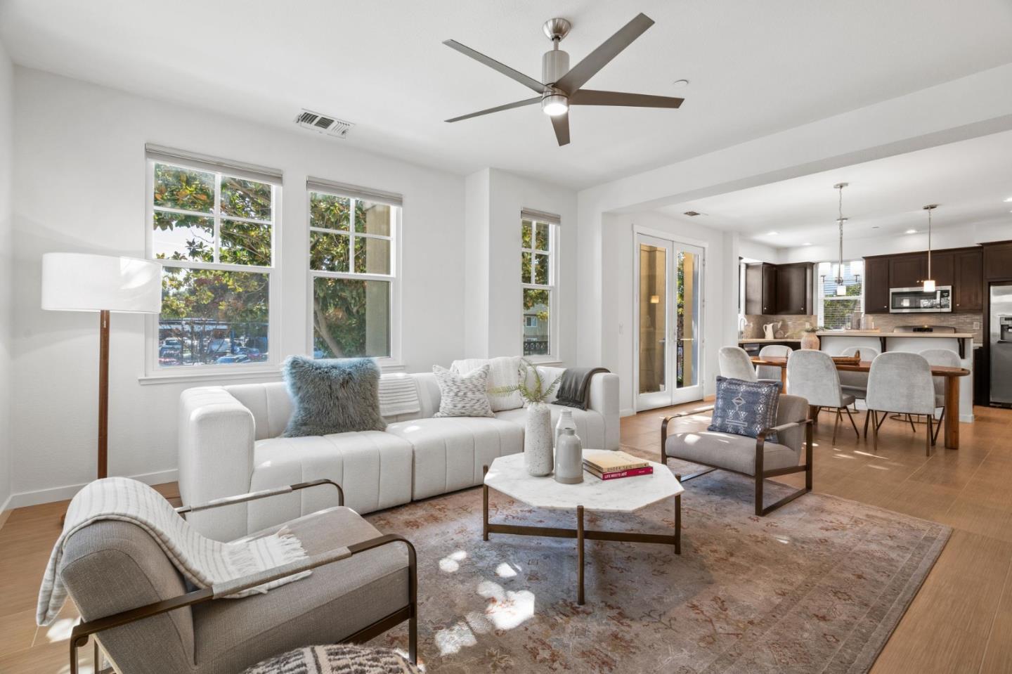110 Calderon Avenue Mountain View, CA 94041 - Photo 1 of 25 a living room with furniture and a large window