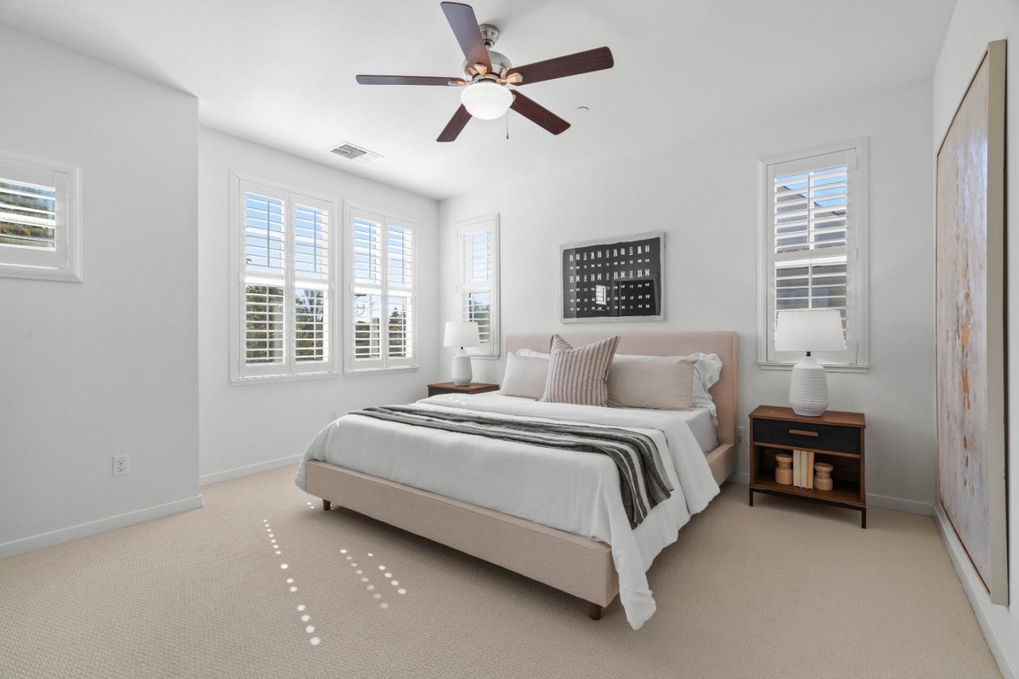 110 Calderon Avenue Mountain View, CA 94041 - Photo 12 of 25 a bed room with a bed and a ceiling fan