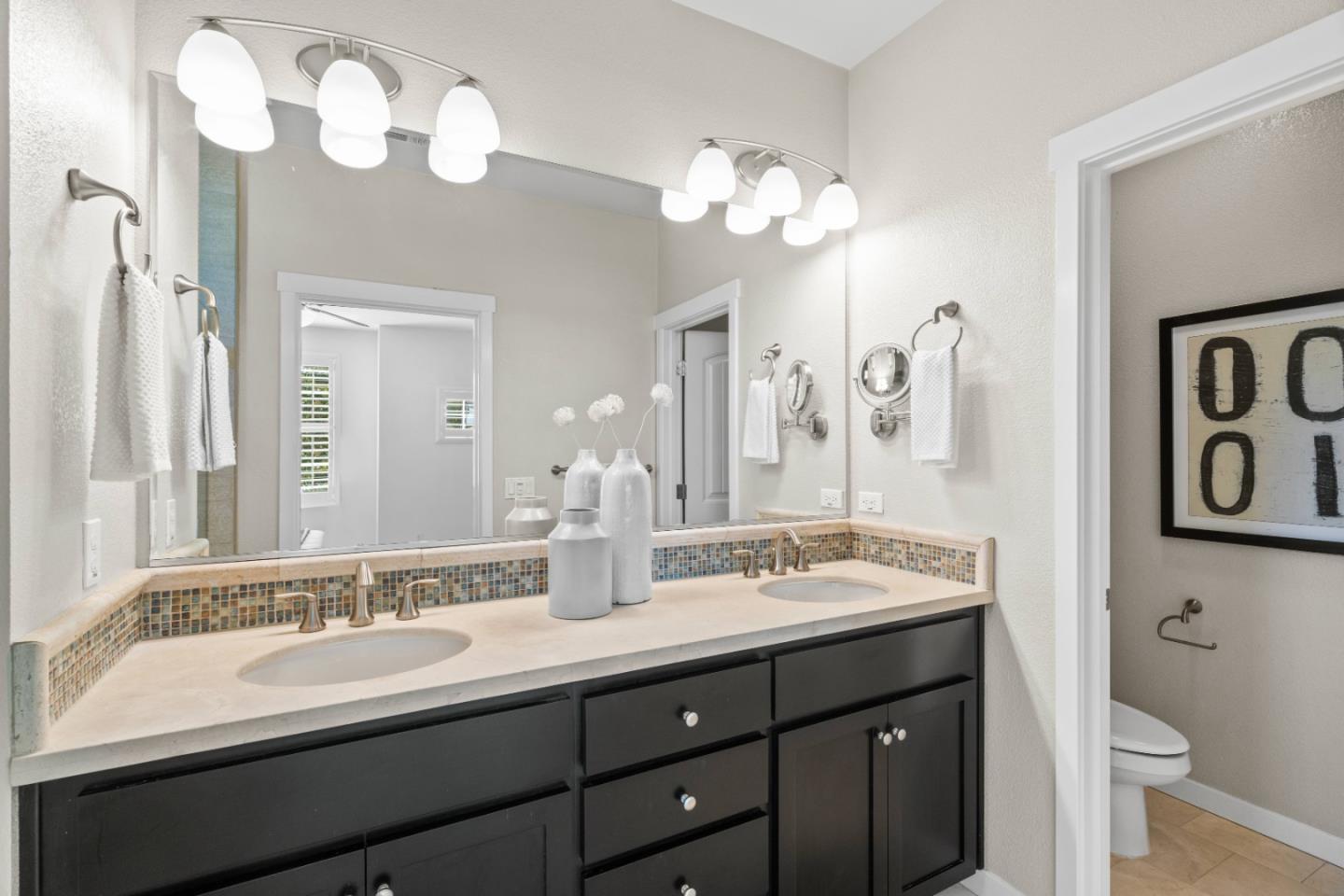 110 Calderon Avenue Mountain View, CA 94041 - Photo 14 of 25 a bathroom with a double vanity sink and a mirror