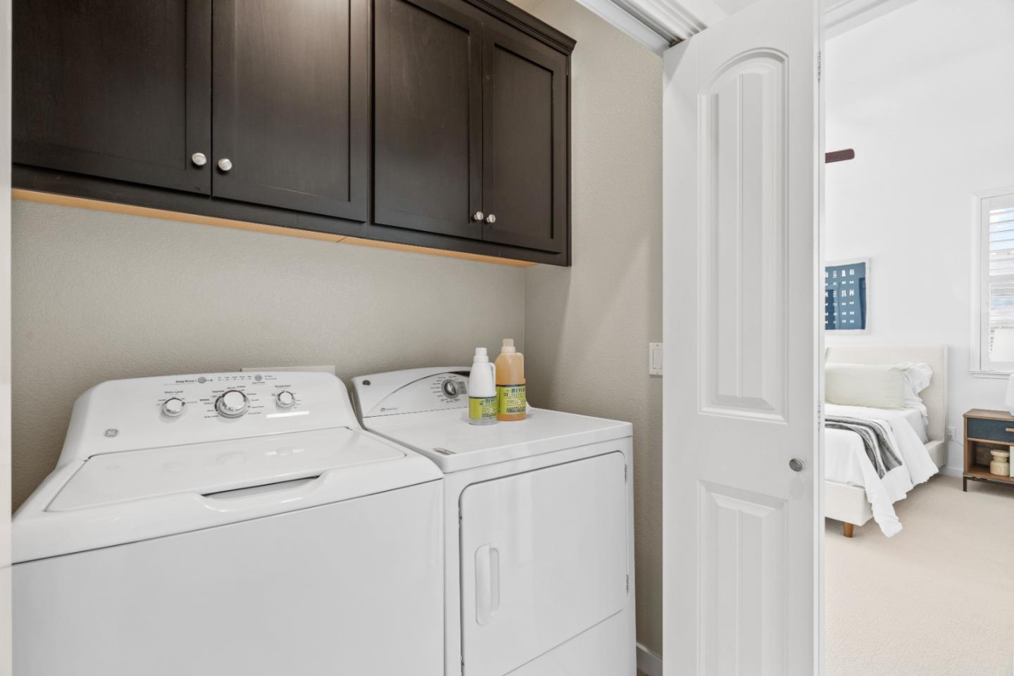 110 Calderon Avenue Mountain View, CA 94041 - Photo 21 of 25 a utility room with dryer and washer