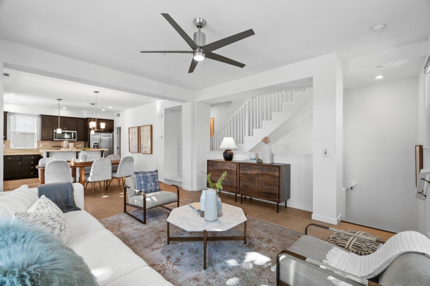 110 Calderon Avenue Mountain View, CA 94041 - Photo 6 of 25 a living room with furniture and a wooden floor